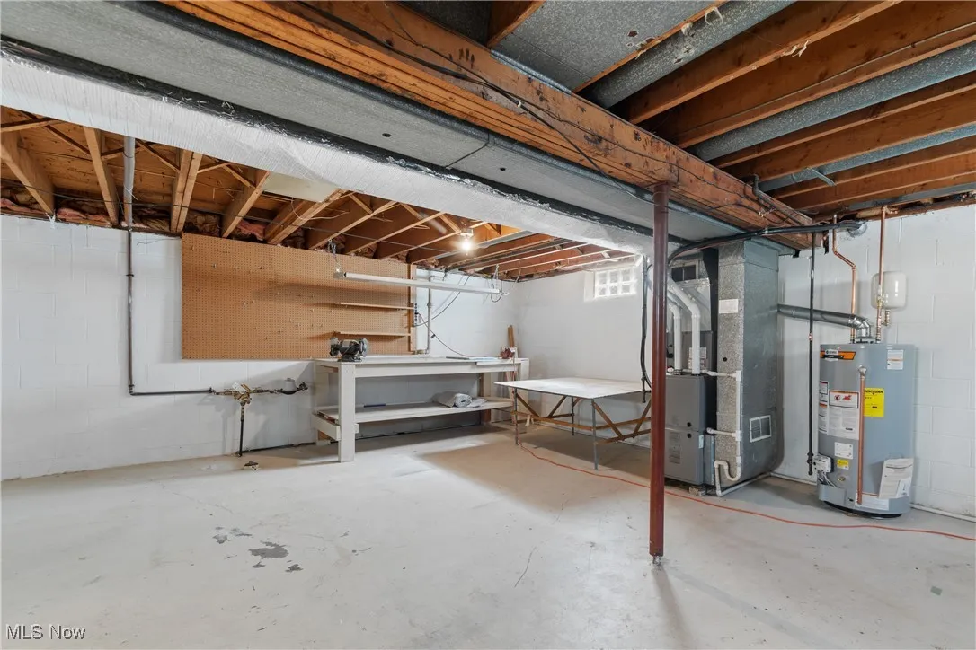 Basement with heating unit and gas water heater