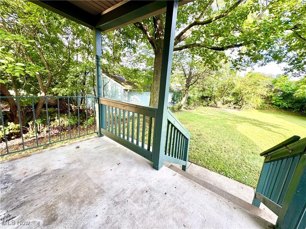 View of patio / terrace with a water view