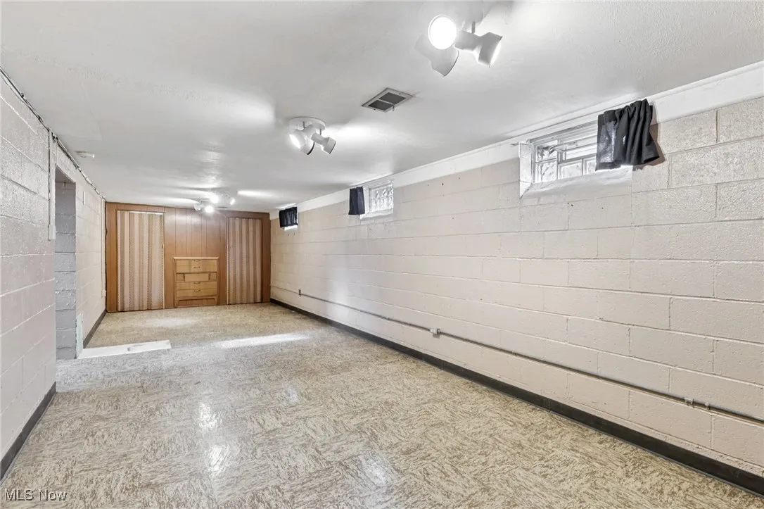 Below grade area with tile patterned floors