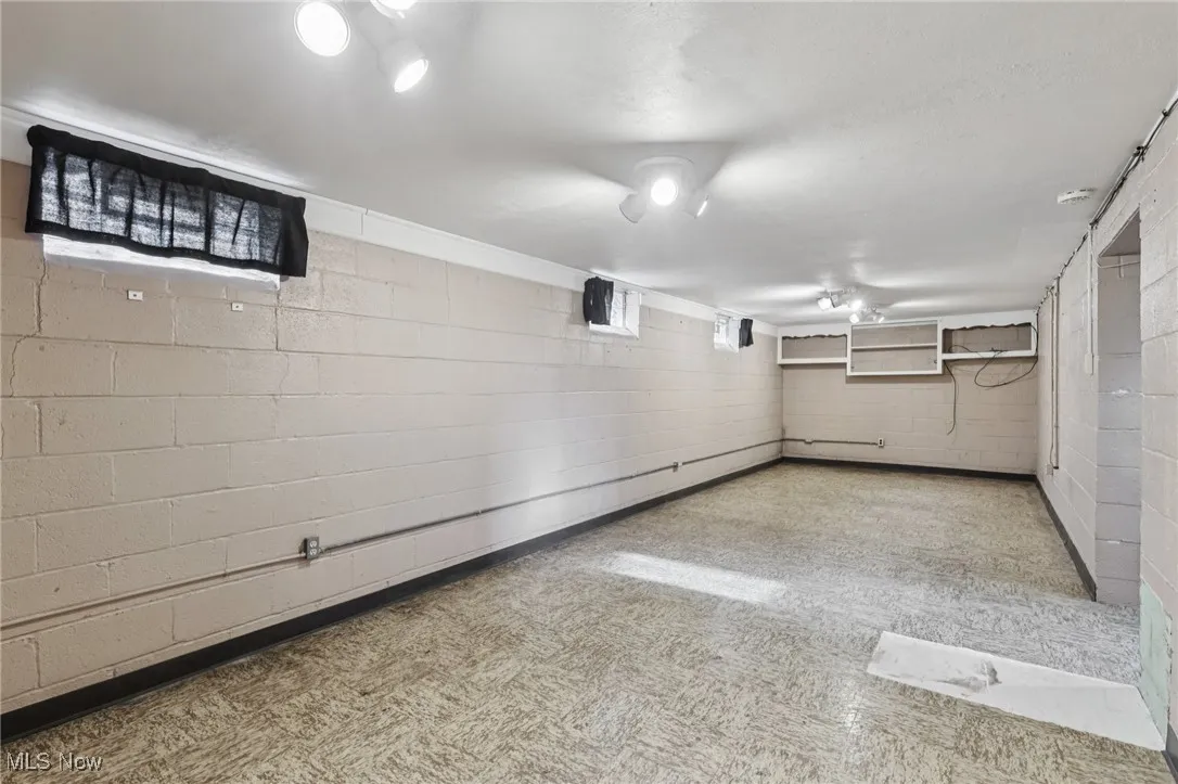 Below grade area with tile patterned floors