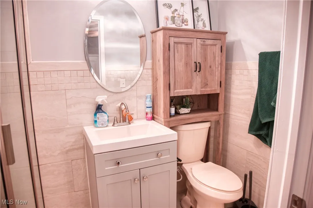 Master Bathroom featuring a sit down shower, toilet and vanity