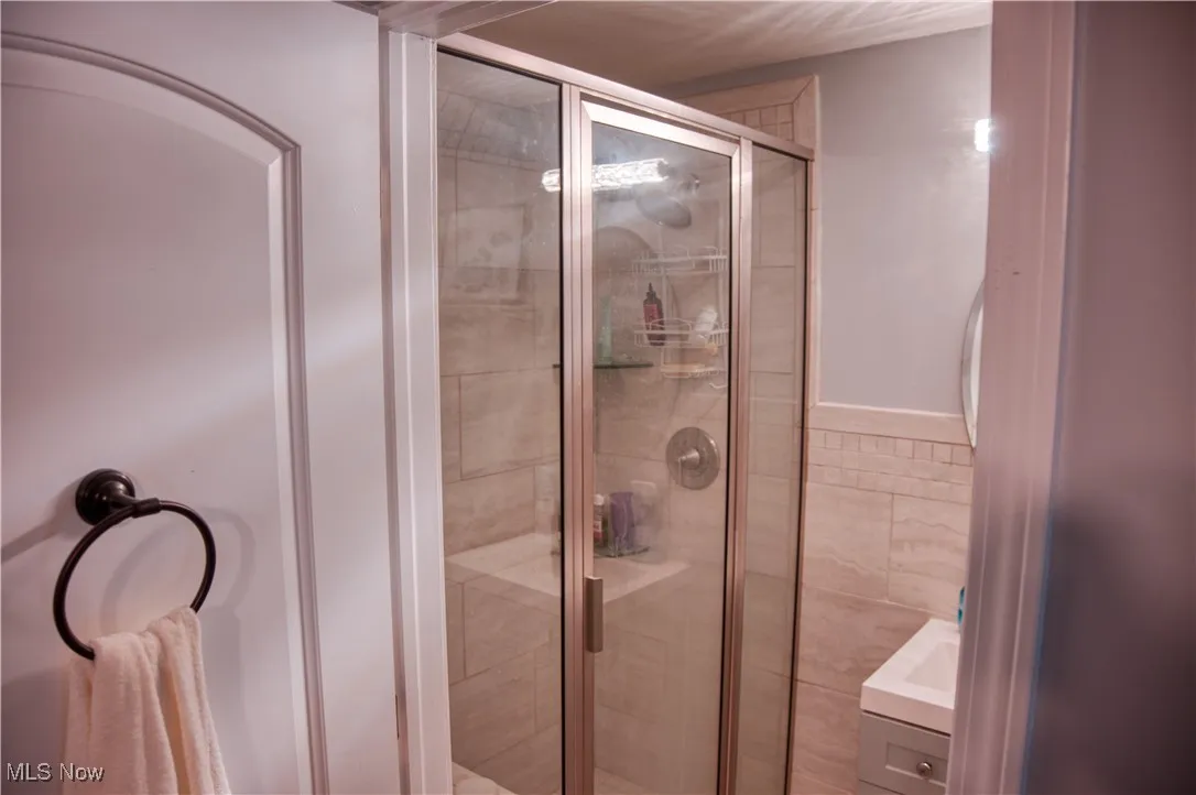 Master Bathroom featuring a sit down shower, toilet and vanity