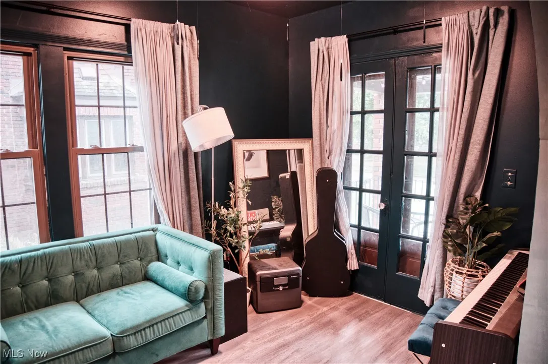 Living area with french doors and LVT floors