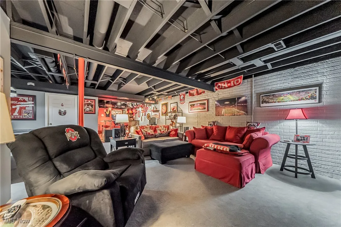 Basement with light colored carpet