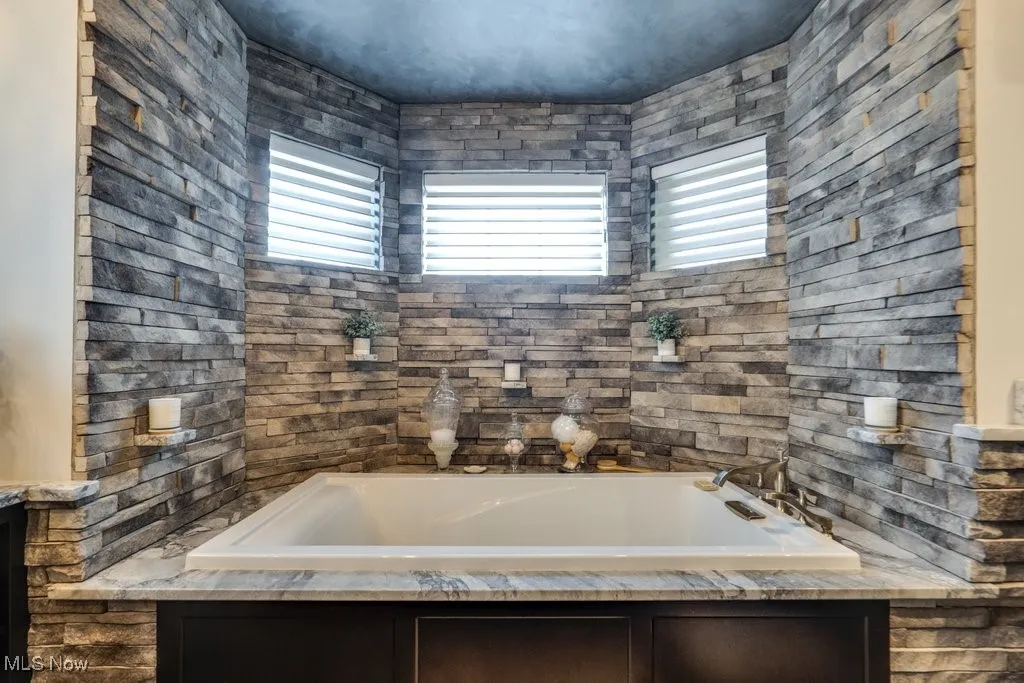 Full bath with a bath