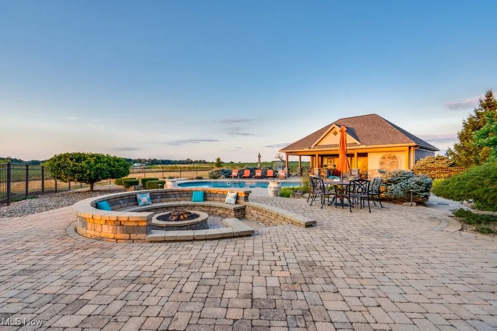 Swimming pool with a patio area