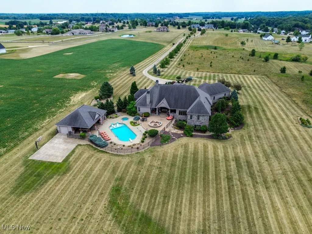 View of rural area featuring a pool area