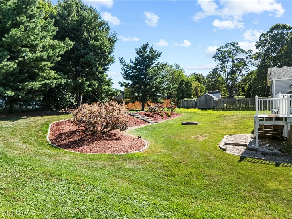 View of yard featuring view of wooded area