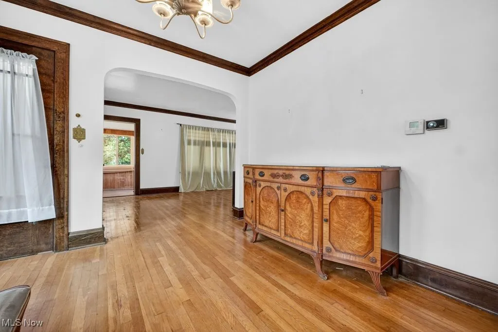 Second Floor Dining Room, crown molding, hardwood / wood-style floors.