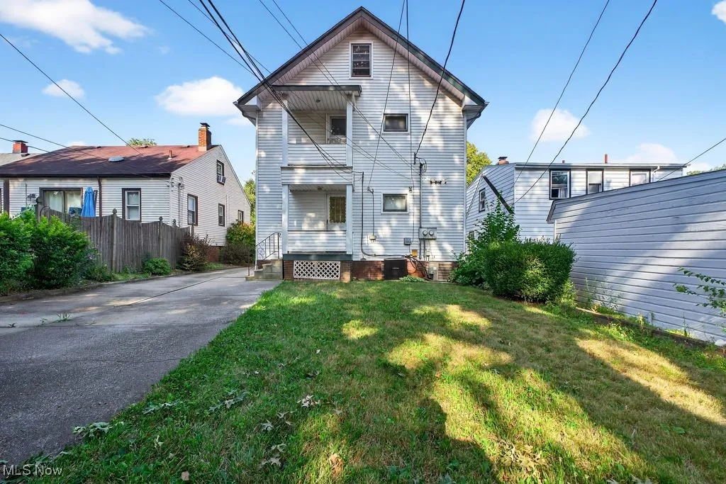 Rear view of house with a balcony