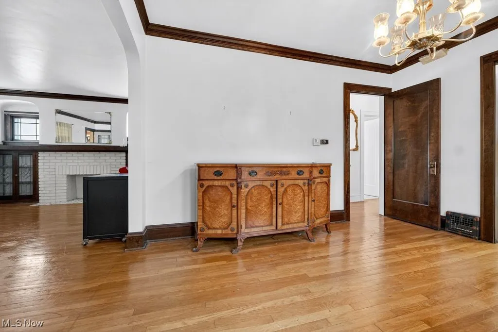Second Floor Dining Room, crown molding, hardwood / wood-style floors.