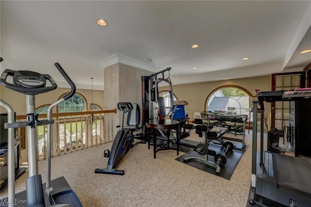 Exercise area featuring carpet and recessed lighting