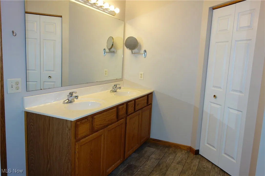 Master Bathroom w/ double sinks and a walk-in closet
