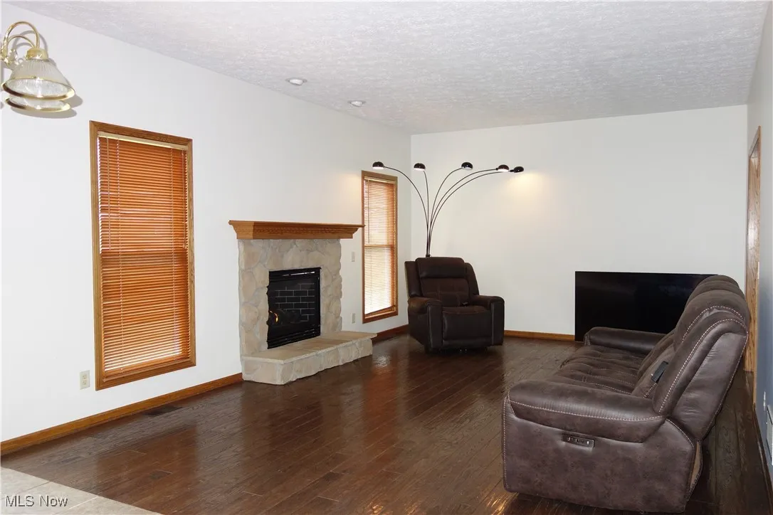 Family Room w/ Gleaming wood flooring