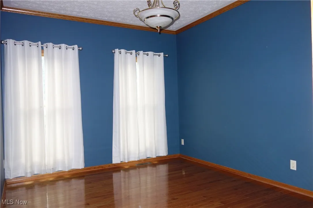 Dining Room w/ Gleaming wood flooring