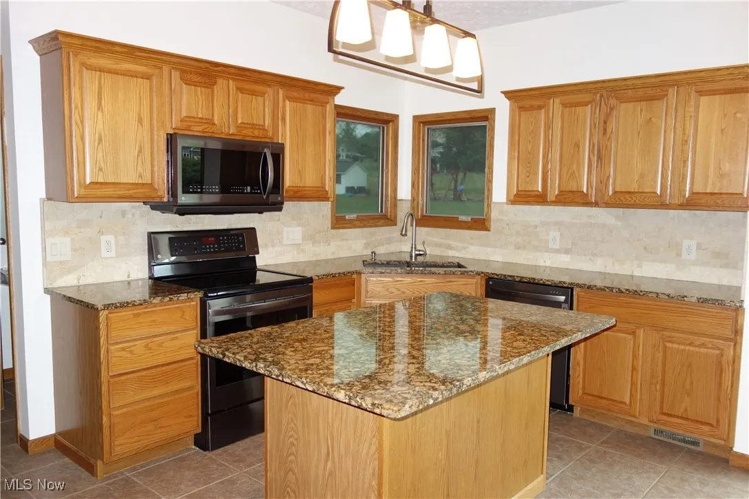 Updated since build w/ rich granite countertops
