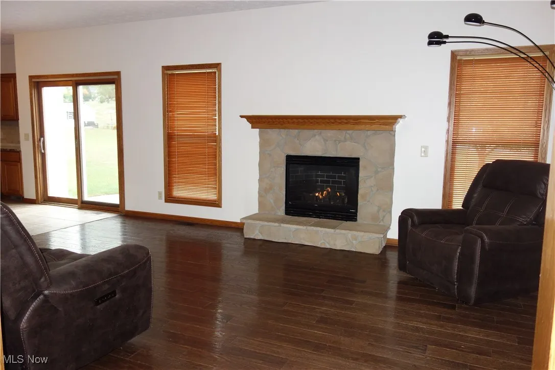 Family Room w/ Gleaming wood flooring
