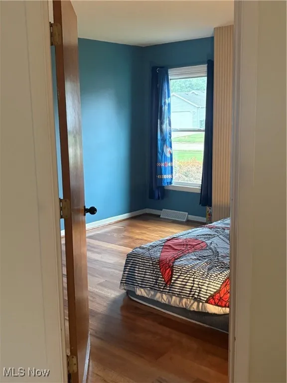 Bedroom featuring light wood finished floors