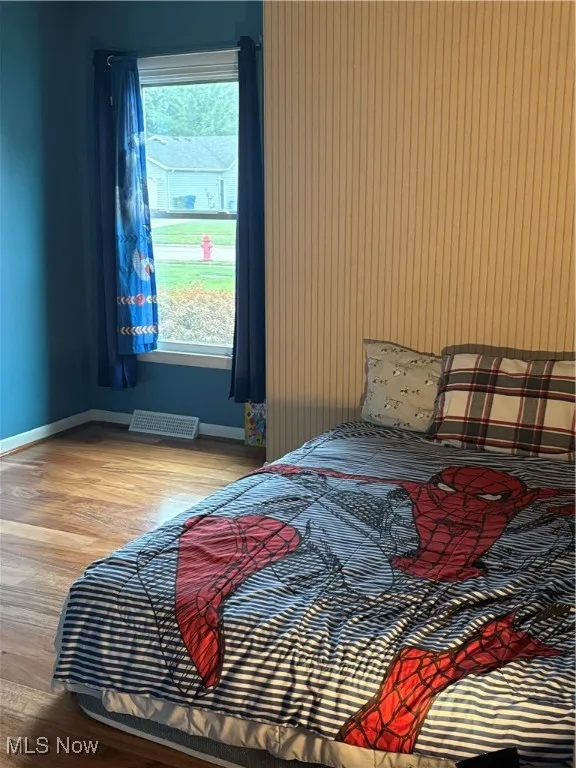 Bedroom with light wood-type flooring