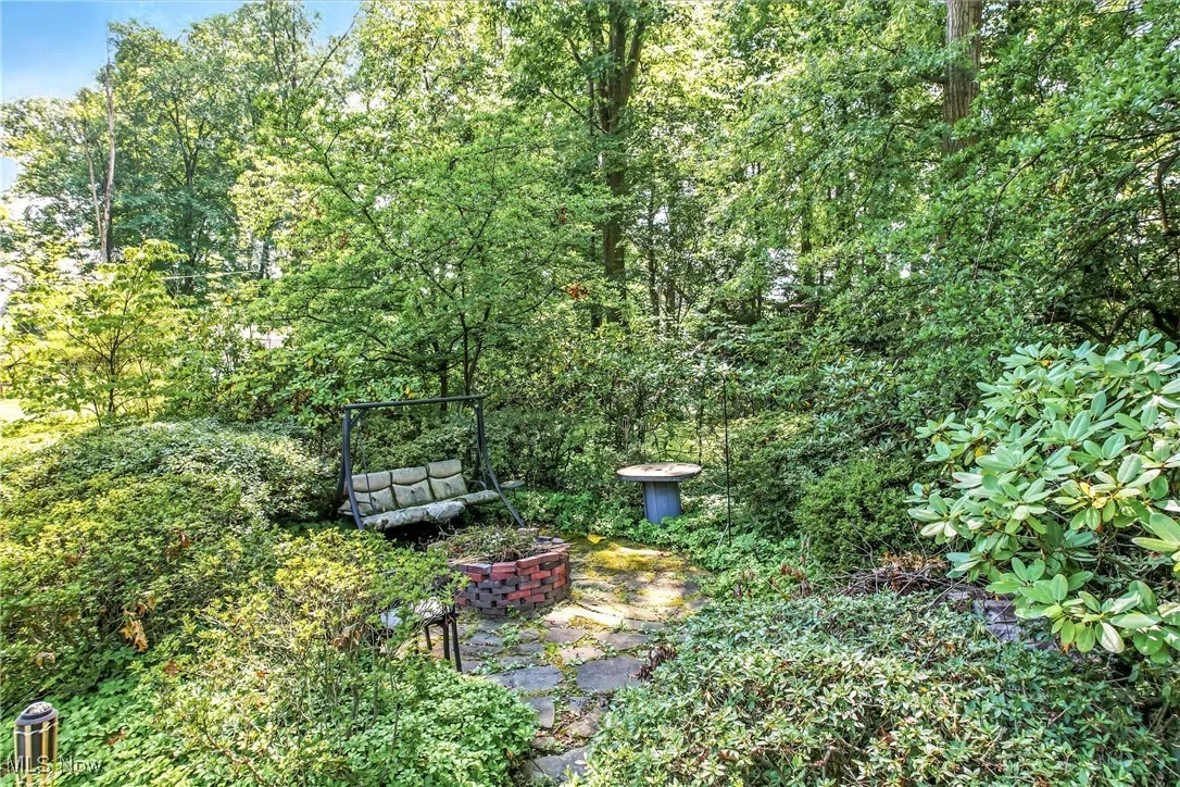 View of yard with firepit