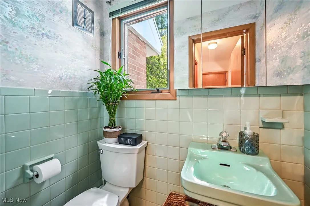 Bathroom with toilet and a sink