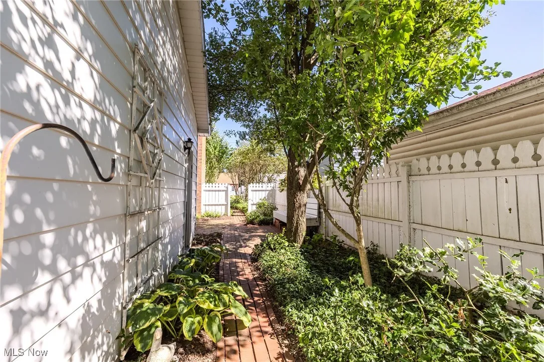 View of yard with a wooden deck