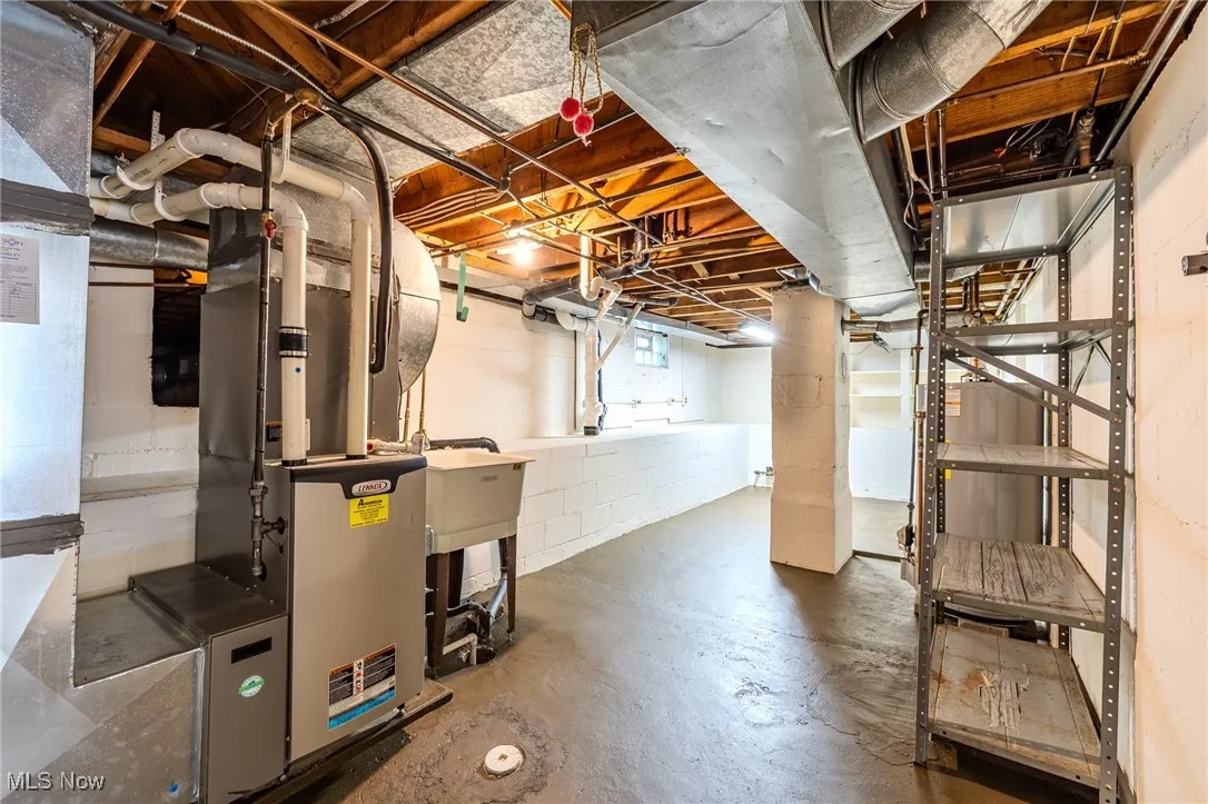 Below grade area featuring a sink