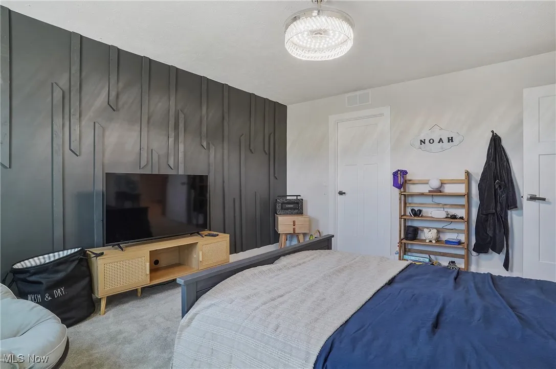 Bedroom featuring carpet floors