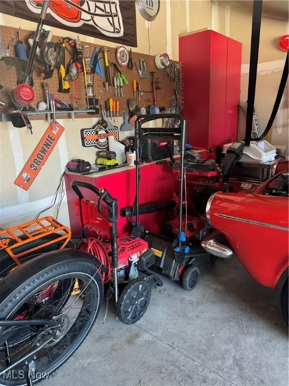 Garage featuring a workshop area