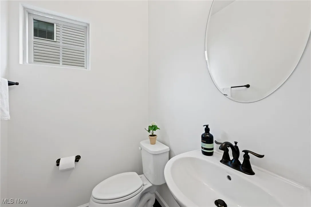 Bathroom featuring a sink and toilet