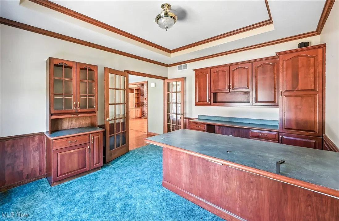 Tray ceilings, built ins & desk for work from home space.