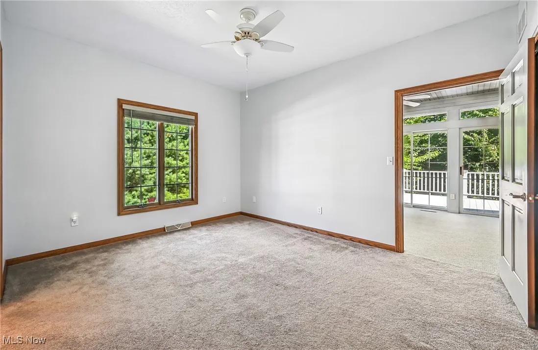1st floor 3rd bedroom that exits to 4 season sun room
