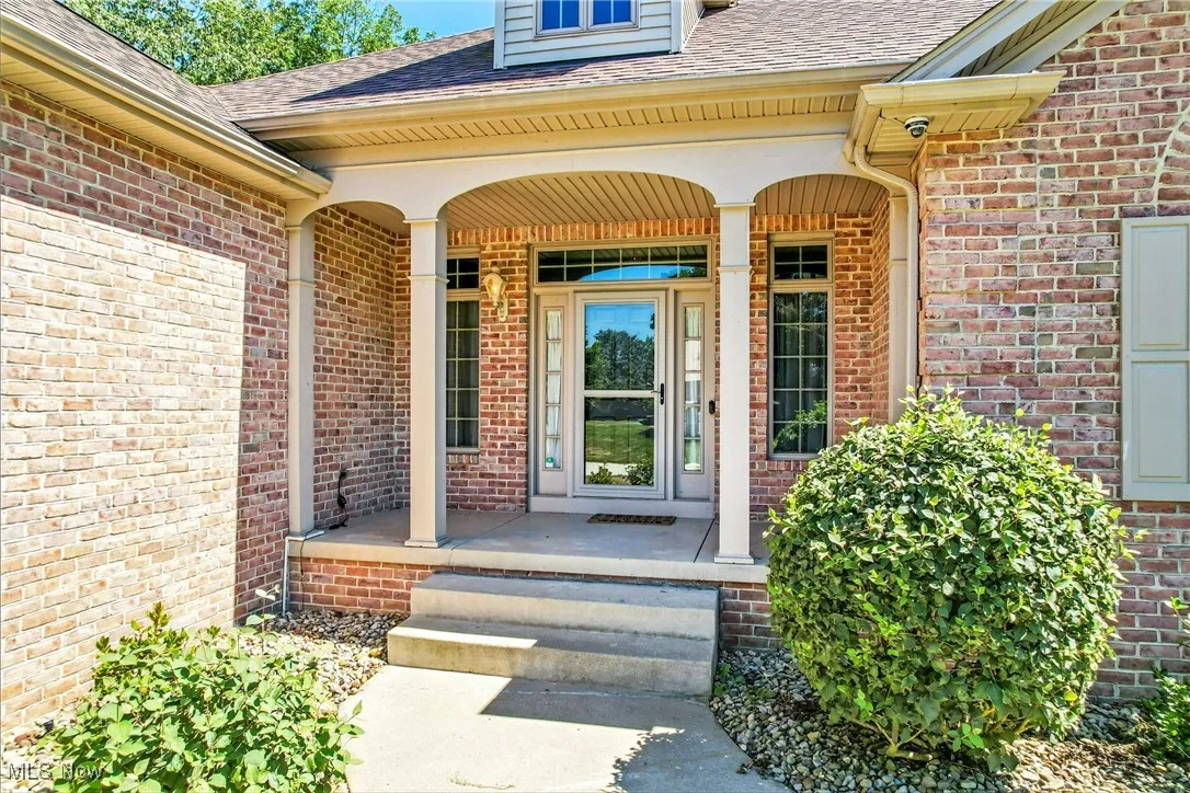 Front entry leads to designated office, & lower level in law suite access