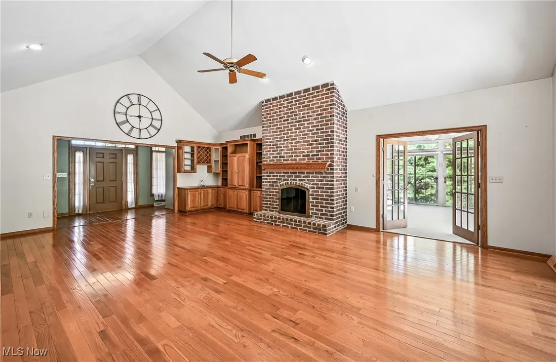 Vaulted ceilings, wood flooring, stone front gas fireplace, wet bar.