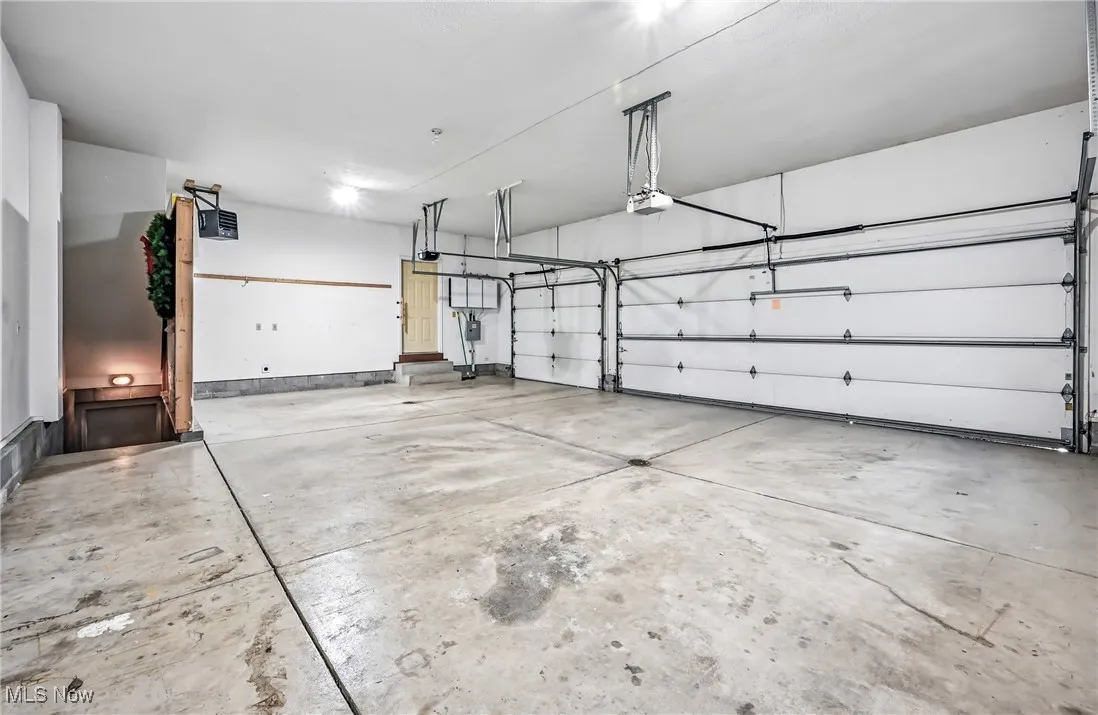 3 car garage, basement access, mudroom access, EV charging