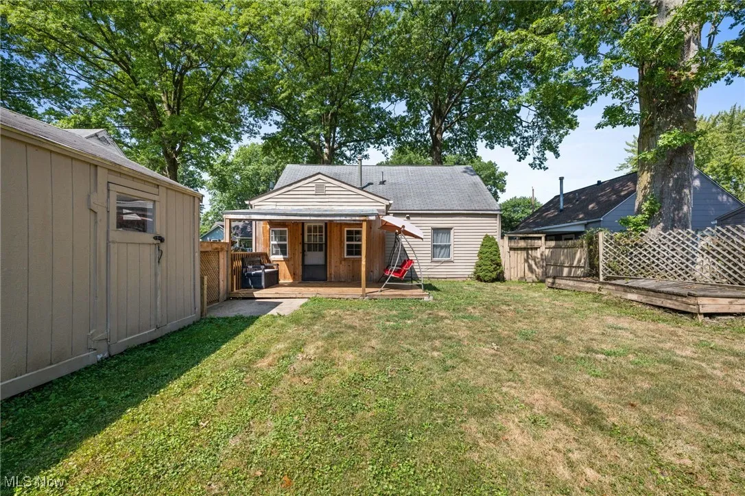 Rear view of property with a patio