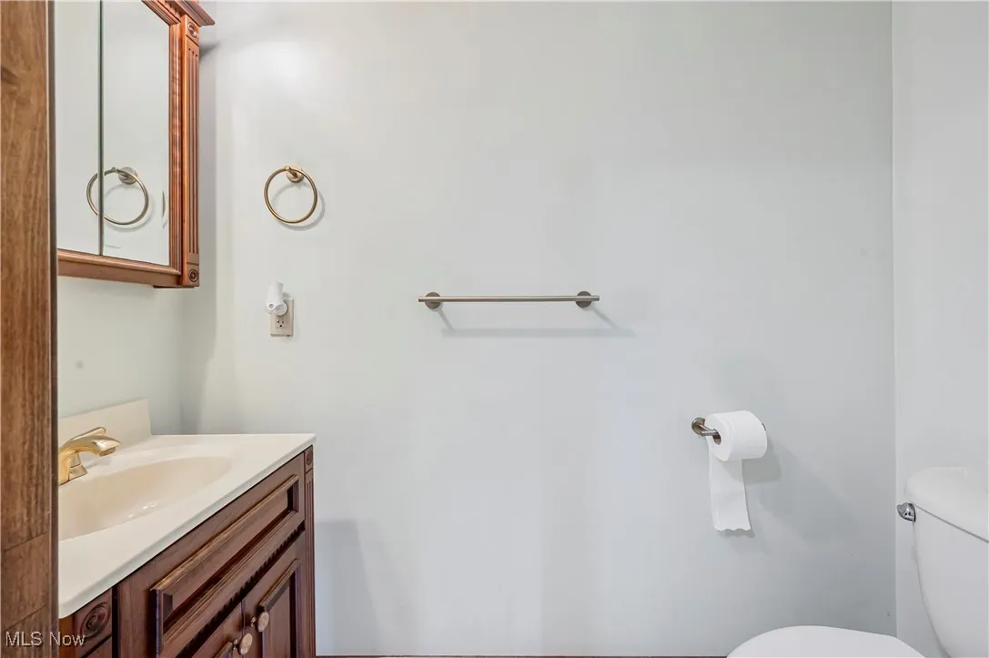 Bathroom with toilet and vanity