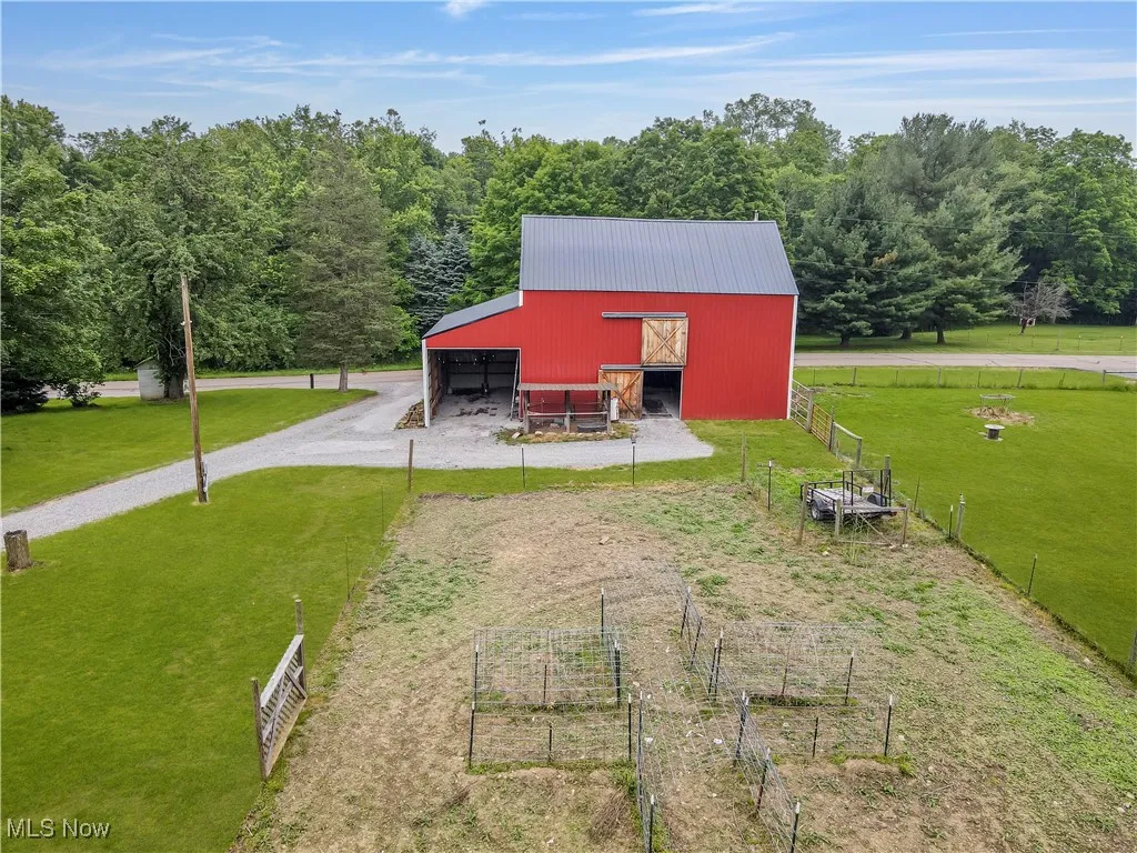 View of pole building with a view of rural / pastoral area