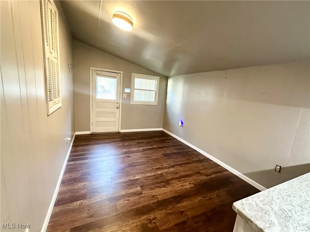 Family room with wood-style floors