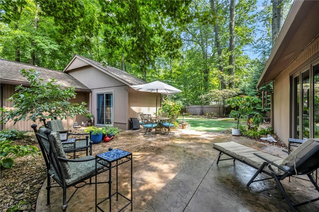 View of patio / terrace with view of scattered trees