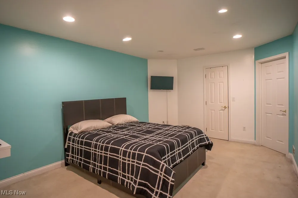 Bedroom featuring recessed lighting and carpet floors