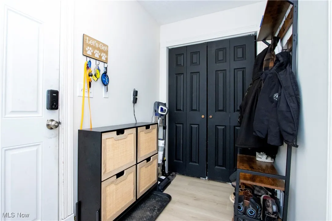 Mudroom with light wood-type flooring