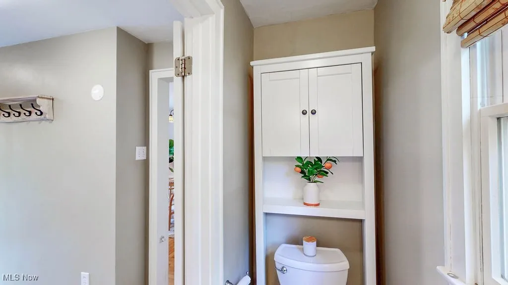 Additional view of half bath.