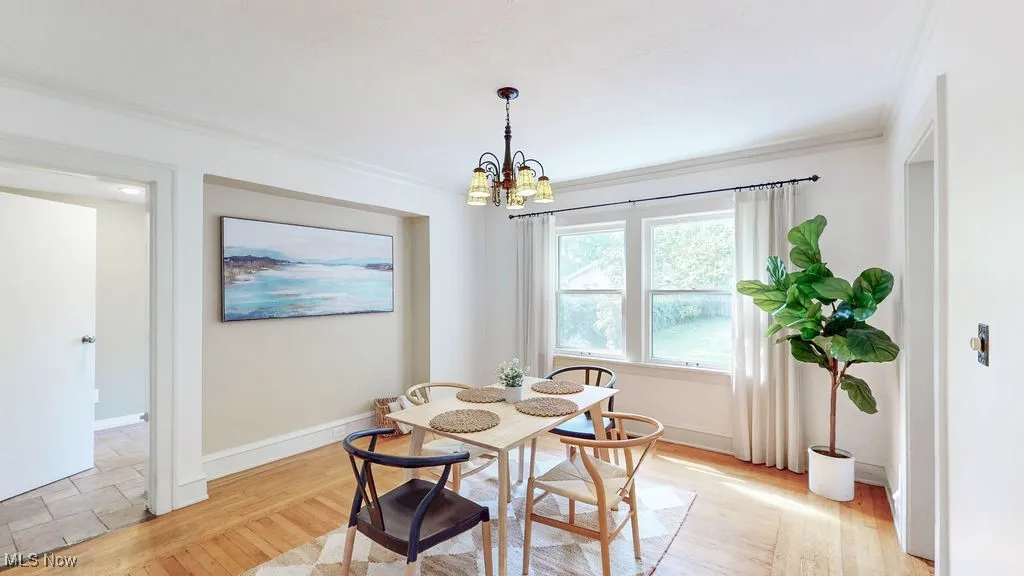 Dining room with hardwood floors.