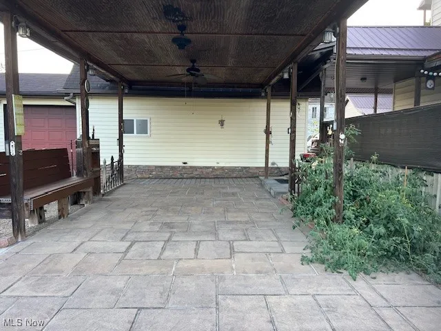 Porch featuring a ceiling fan