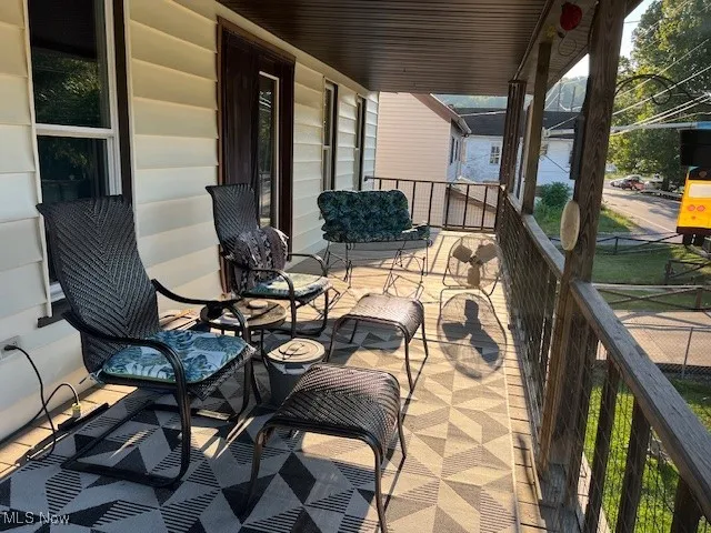 View of covered porch Goes the length covered deck front


