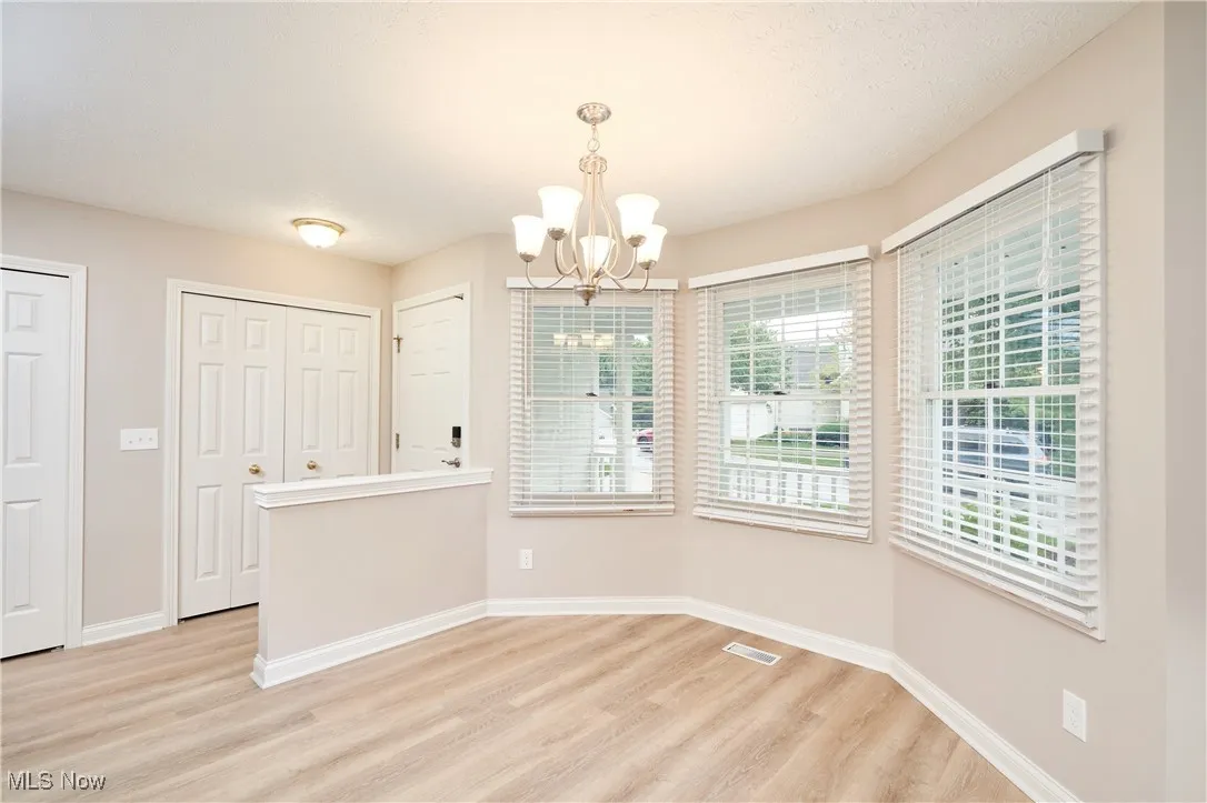 Dining area with two generous closets that could be used as pantry space and/or for coats