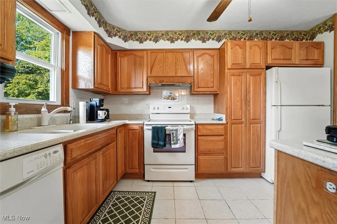 Kitchen with oak cabinets and plenty of counter space