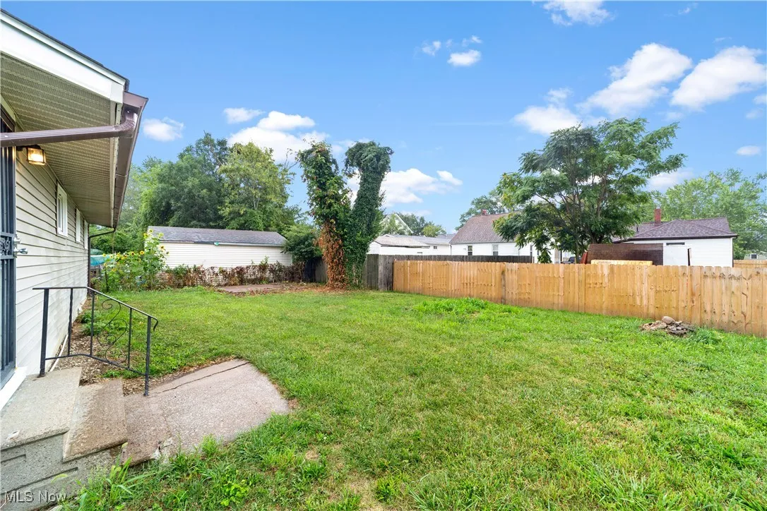 View of fenced backyard