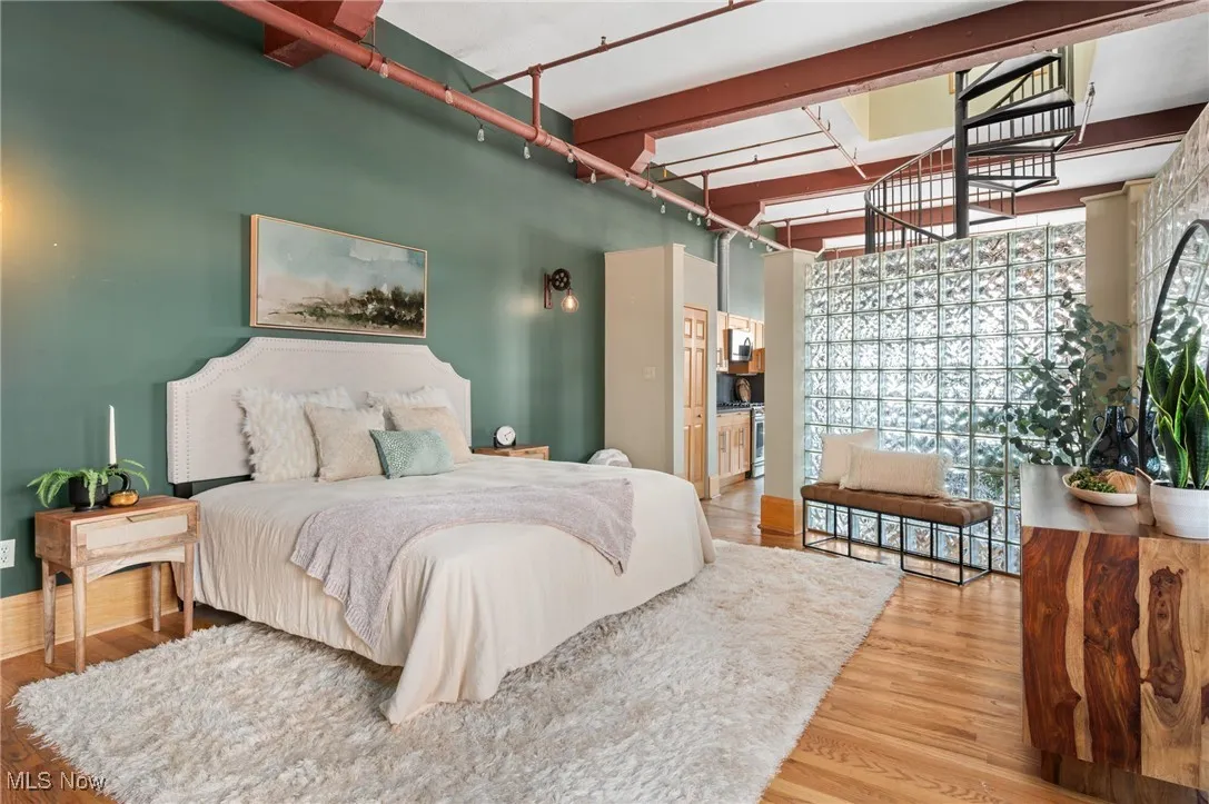 Bedroom featuring wood finished floors